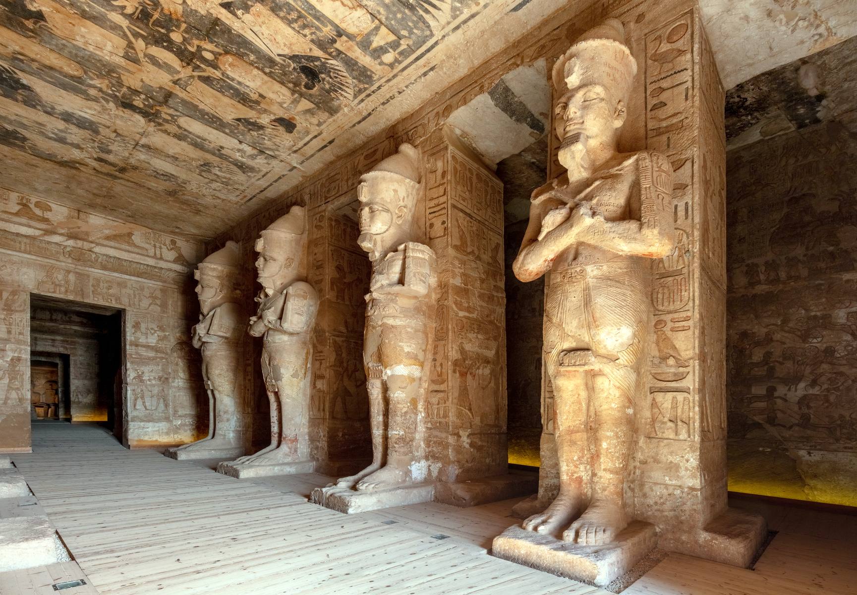 Osiride pillars of Ramesses II lining the great hall inside the Abu Simbel temple