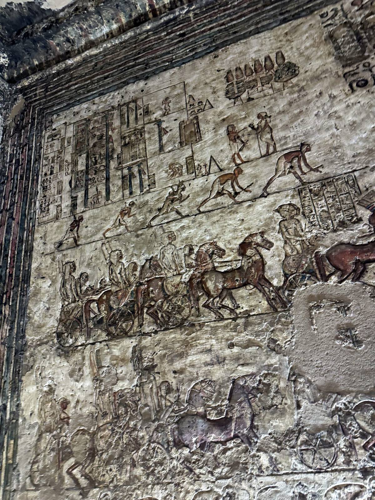 Royal procession with chariots carved in a North Tomb at Amarna