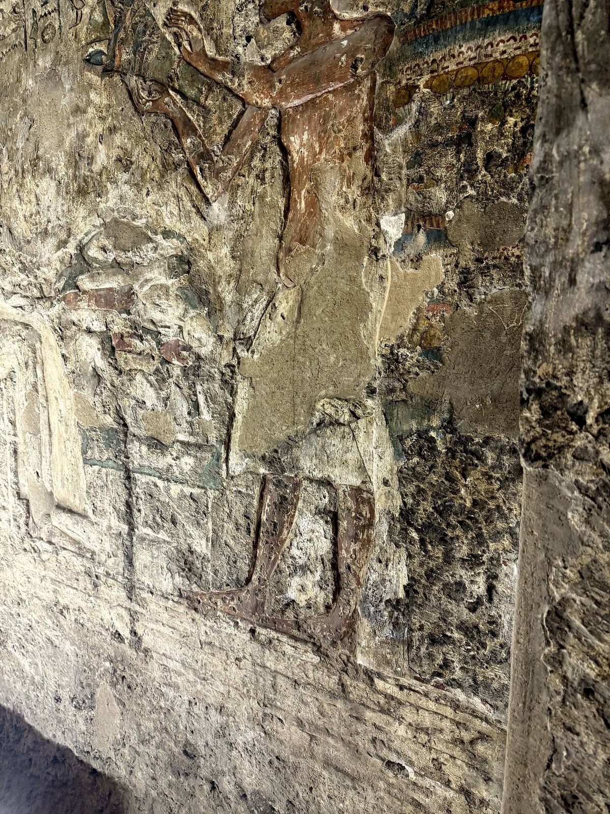 Ancient carved relief in the Tomb of Panehsy at Amarna