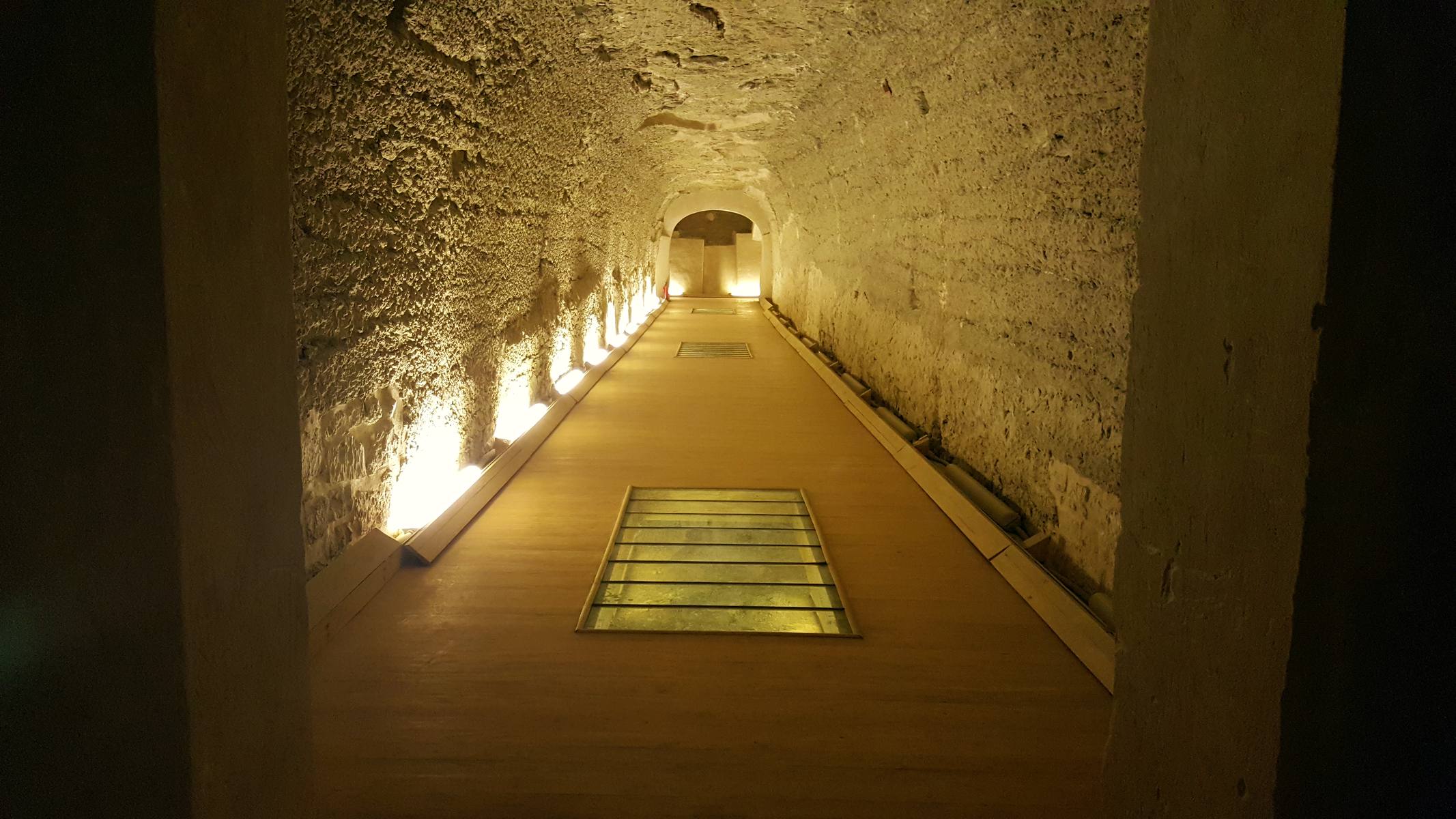 The lamplit corridor of the Serapeum, burial place of the Apis bulls