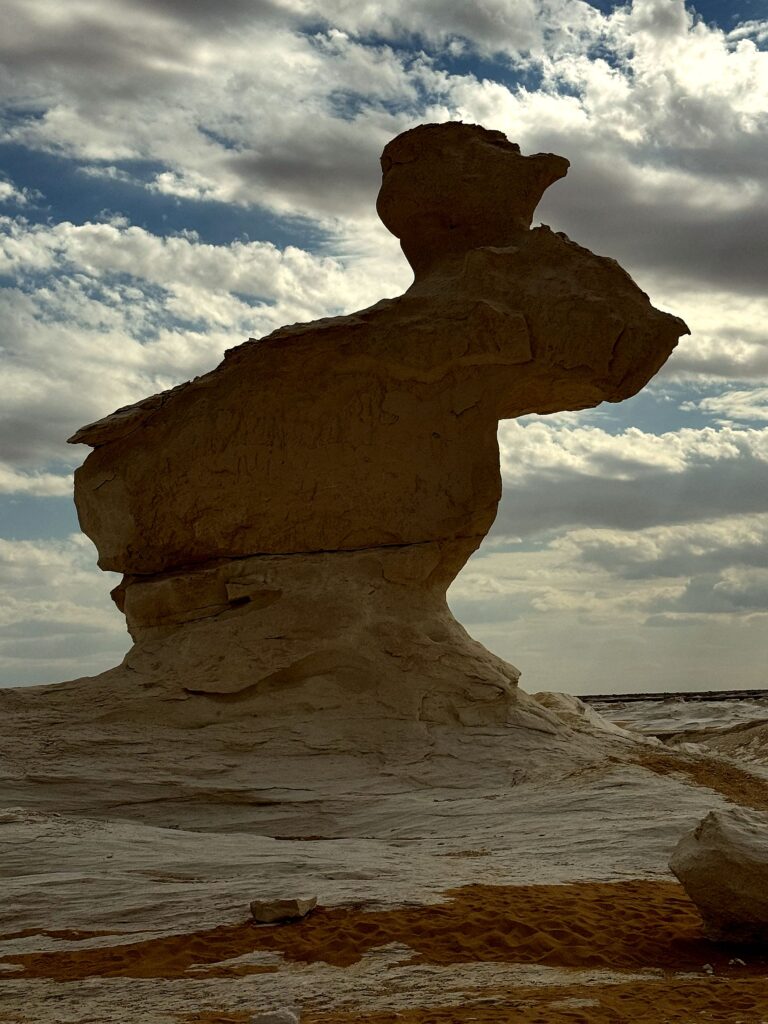 Iconic white chalk rock sculpted by wind under a dramatic sky