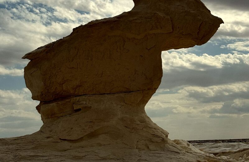 Iconic white chalk rock sculpted by wind under a dramatic sky